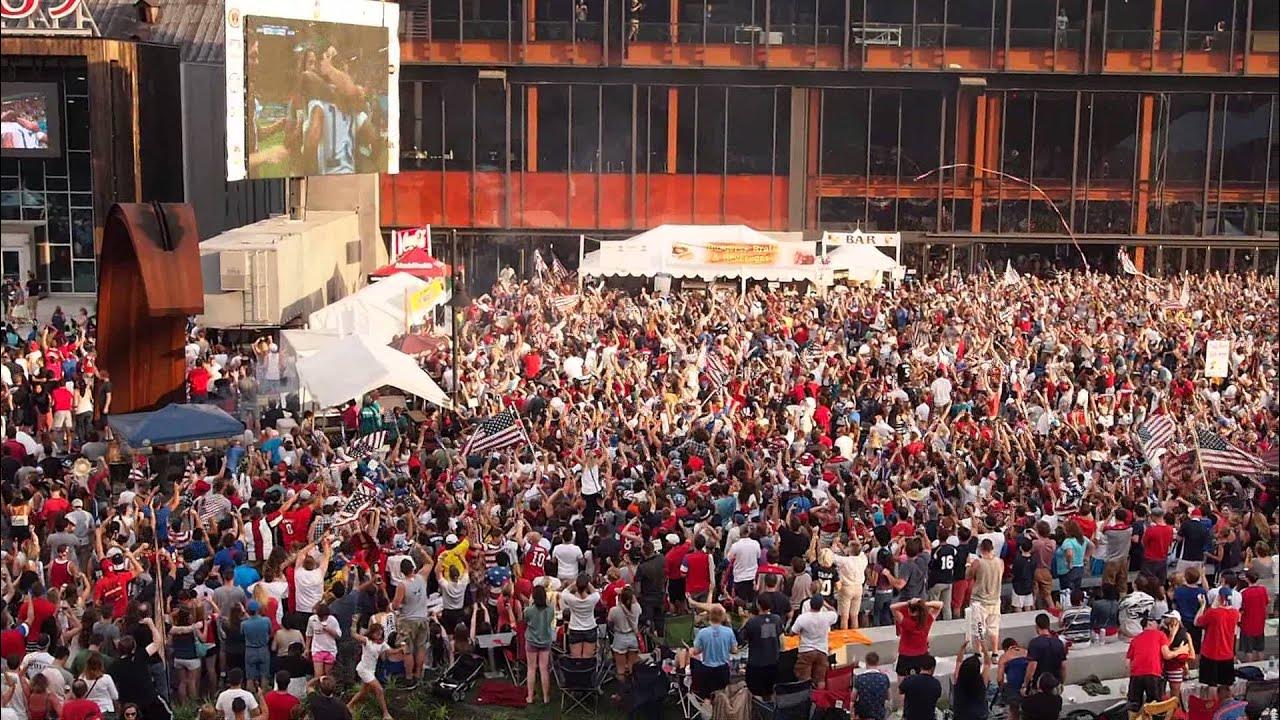 A large crowd watches a World Cup match on a big screen at the SteelStacks campus during SoccerFest