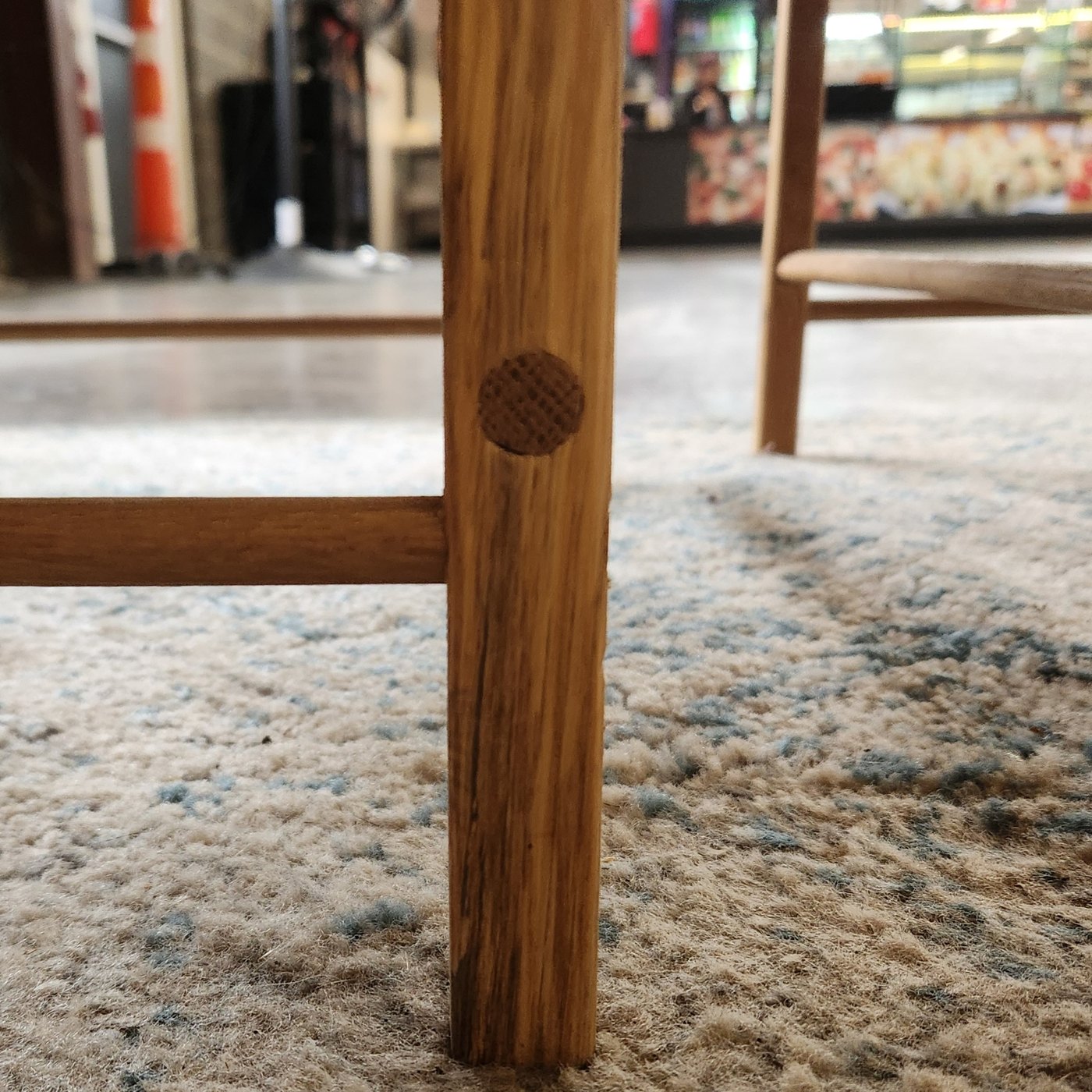 Close-up of a table base showing a visible joint.
