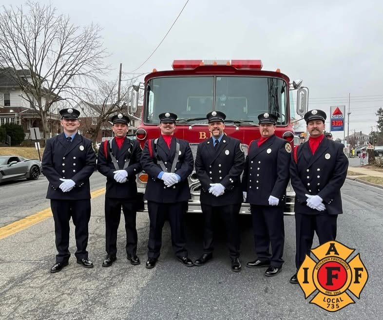 Bethlehem firefighters in dress uniform in front of an engine