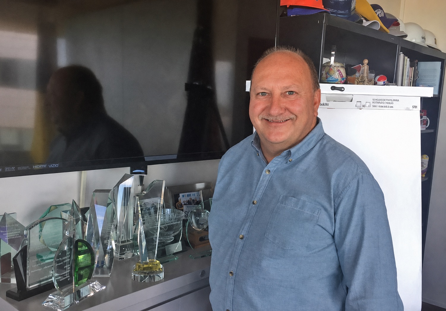 Ed Pawlowski with awards from his years in public life