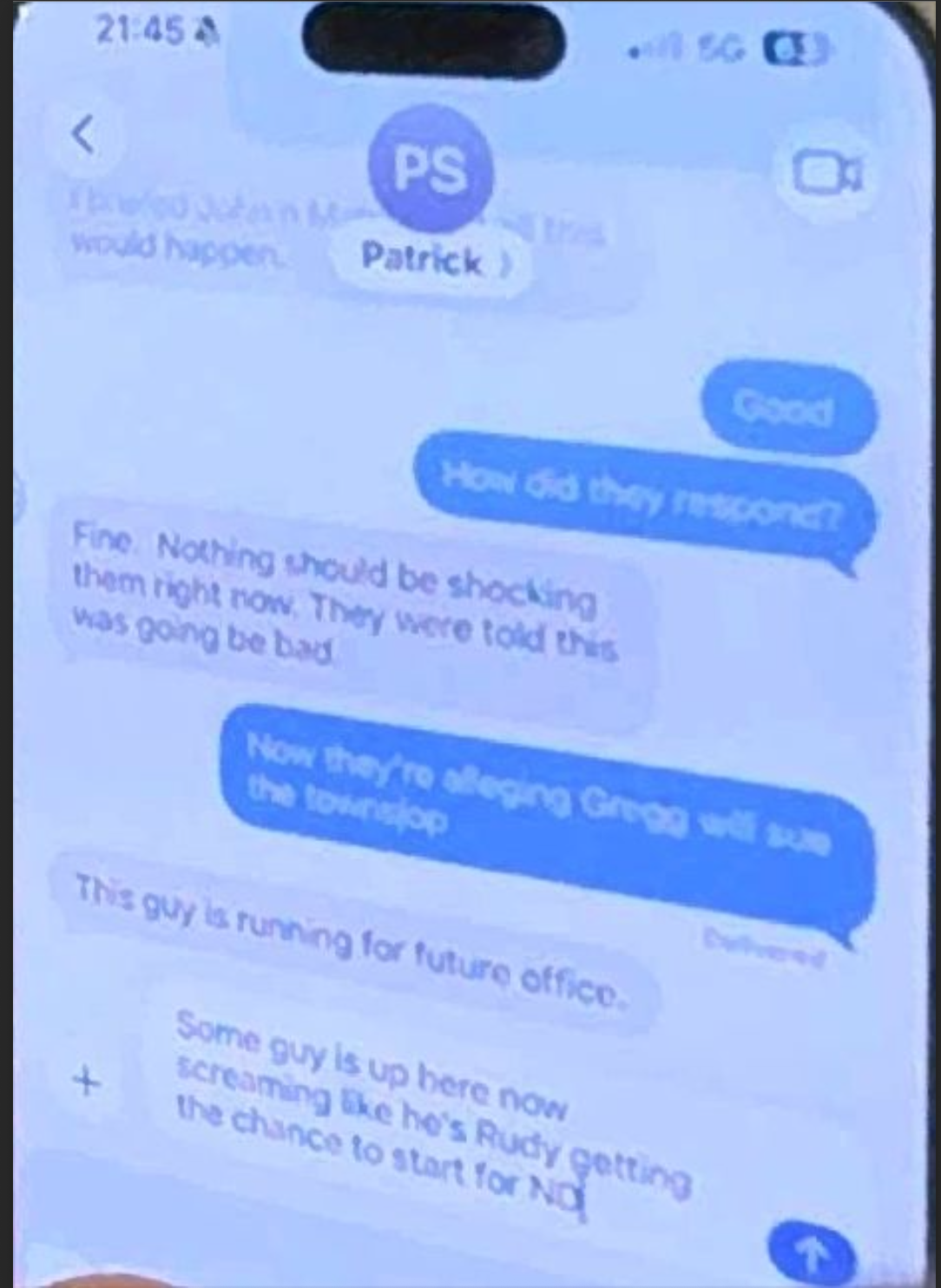 Screenshot of text messages photographed at the July 9 South Whitehall meeting