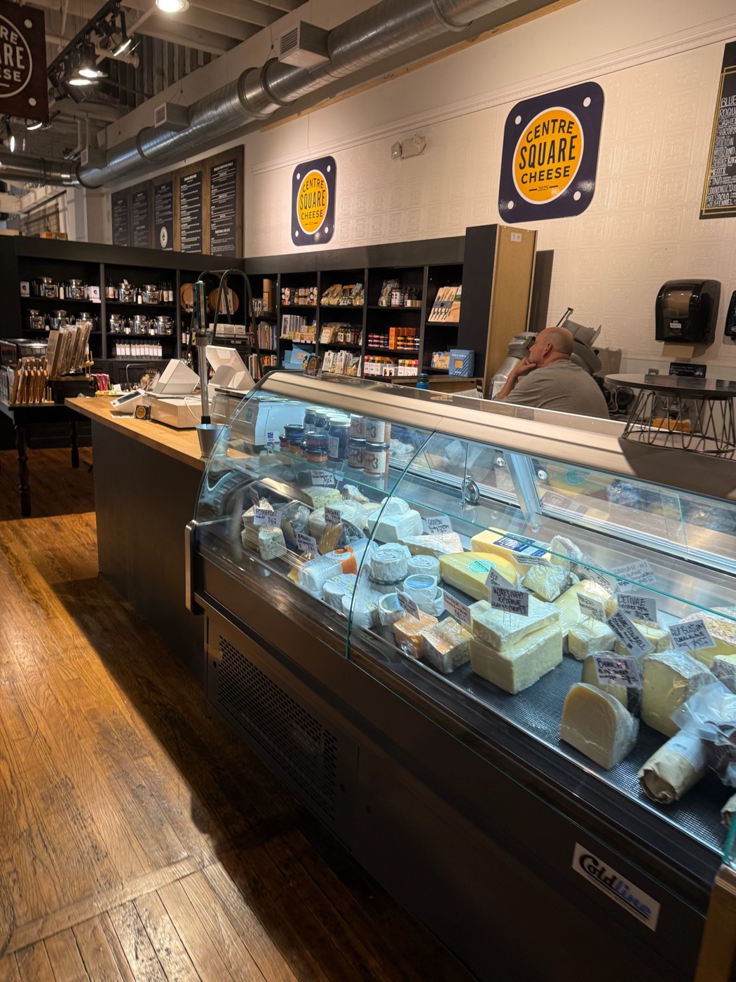 The curved cheese case at Centre Square Cheese